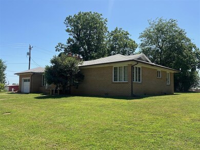 View of home's exterior featuring a yard