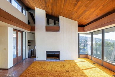 Old redwood ceilings, original tile and shag carpet