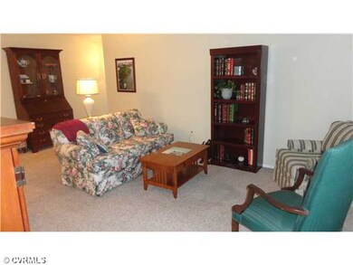 Living Room - Freshly painted spacious living room is light and cheery.