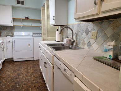 UPDATED KITCHEN WITH SOLID COUNTERS