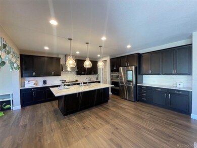 7933 S Kewaunee Way, Aurora, CO 80016 - photo 2