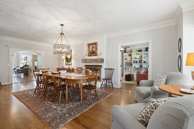 Downstairs living room is currently being used as a dining room.