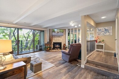 Entry and Living Area with corner electric firepla
