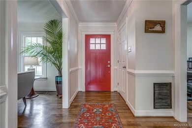 A large coat closet and updated, stylish half bath