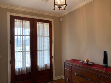 Lovely hardwood floors in the double doored entry!