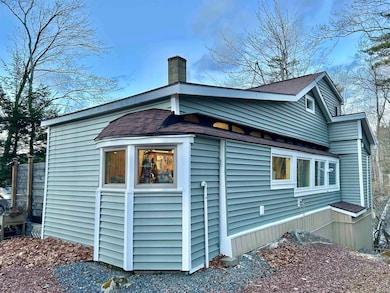 Rear of home with new siding
