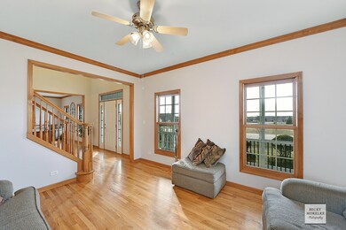 Gleaming hardwood floors, 10 ft ceilings, and mass