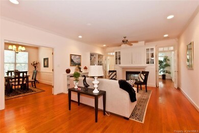 9 Ft Ceilings & Beautiful Red Oak Flooring Accentu