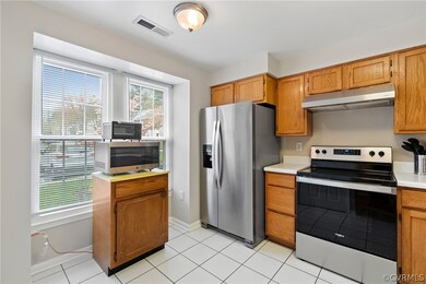 Kitchen with appliances with stainless steel finis