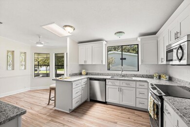 Granite Counter Tops, New Cabinets, New SS Appliances, Deep SS Sink, Tons of Cabinets and Kitchen Nook.
