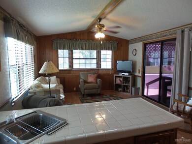 Kitchen looking into living room area