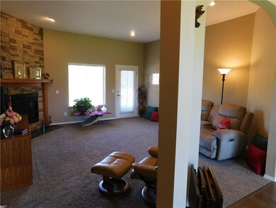 Standing in the entry way looking into the living 