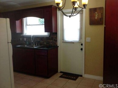 Kitchen - Back Door to Side Yard