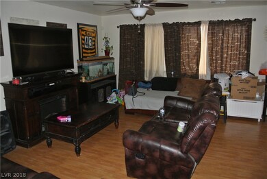 Living Room with Laminate Woodfloors and Ceiling F