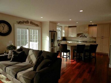Sliding glass doors lead to a...