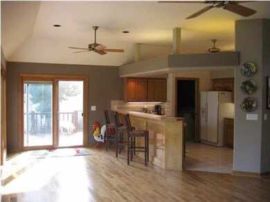 Kitchen opens out to the upper deck. Washing dishe