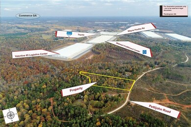 Birds eye view of property featuring a view of tre