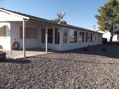 Side view of front of home with AZ room