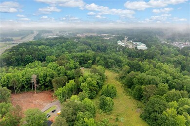 Right side showing the pasture of the 20 acres top left is the additional 7 acres and the land crosses N. Rope Mill Road.  Close Proximity to I-575 in the left corner
