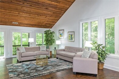 Living Room feature gorgeous wood planked vaulted 