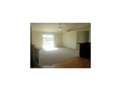 Living Room. Picture is of similar unit.  Buyer to