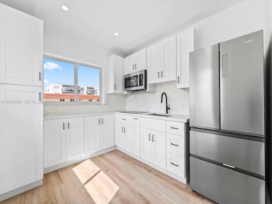 300 NW 7th Ave unit 1, Miami, FL 33128 - photo 3