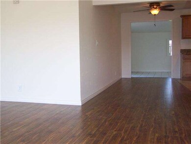 View from Living Room to Dining Area and Kitchen