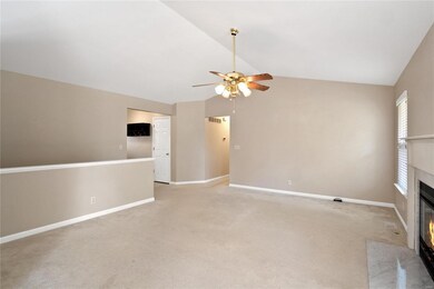 Great Room with Vaulted Ceiling & Gas Fireplace