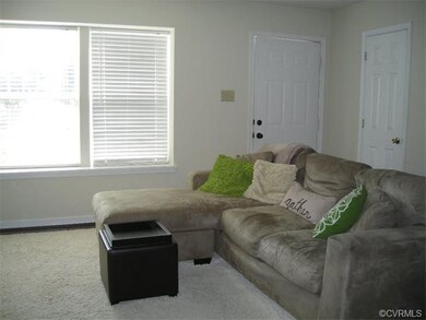Another living room view.  1/2 bath is through doo
