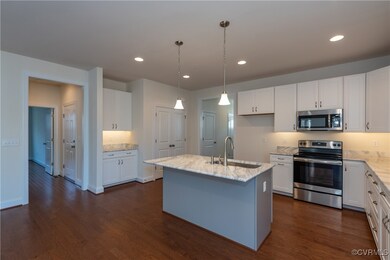 Photos are of a Belmont Plan built in a similar co