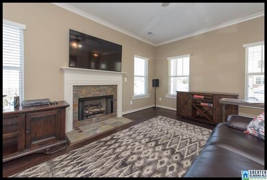 Spacious great room with gorgeous hardwood floors 