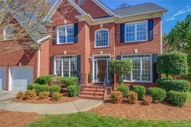 Welcoming entrance, brick steps, transom windows, 
