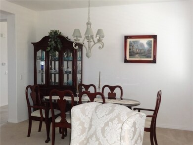 FORMAL DINING AREA ADJACENT TO LIVING ROOM