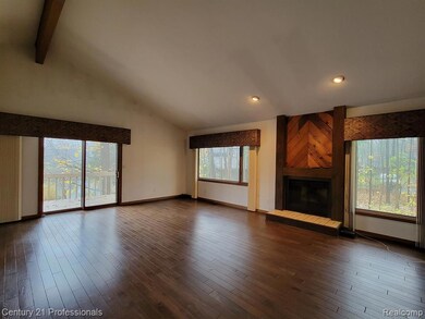 Great rm w/-one side lake view &woods on the other