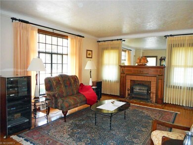 Living Room with Fireplace and Gleaming Wood Floor