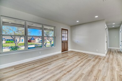 Unfurnished room with recessed lighting, baseboard