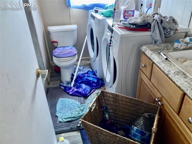 3/4 bath and laundry room. Washer/dryer are less than a year old.