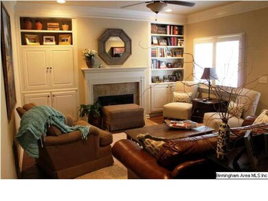 Great room with built-in cabinets, fireplace, hard