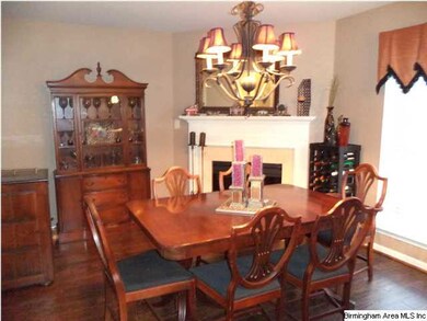 Dining room with hardwood floors.