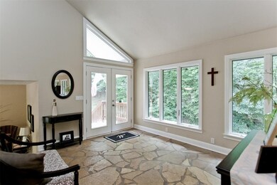 Flagstone floor in the foyer adds a warmth and bri
