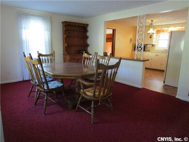 Dining Room. Kitchen opens into bright dining area
