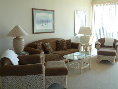 Living room with panoramic view of the lake.