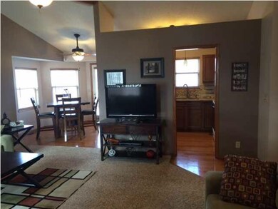 Open to kitchen and dining