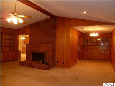 Family Room with Fireplace and built-in bookcases