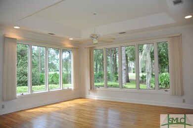 Family Room overlooking back yard and golf course
