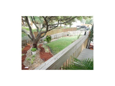 Extensive landscaping and private tree fenced yard