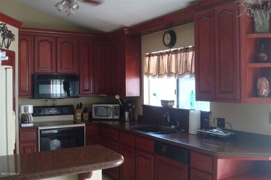 Remodeled Kitchen with Granite and Cherr