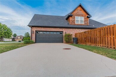 Side entry garage with ample driveway space for pa