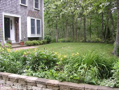 Lush lawn and perennial gardens