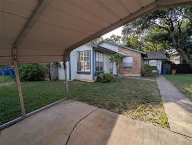 View of patio / terrace featuring a carport